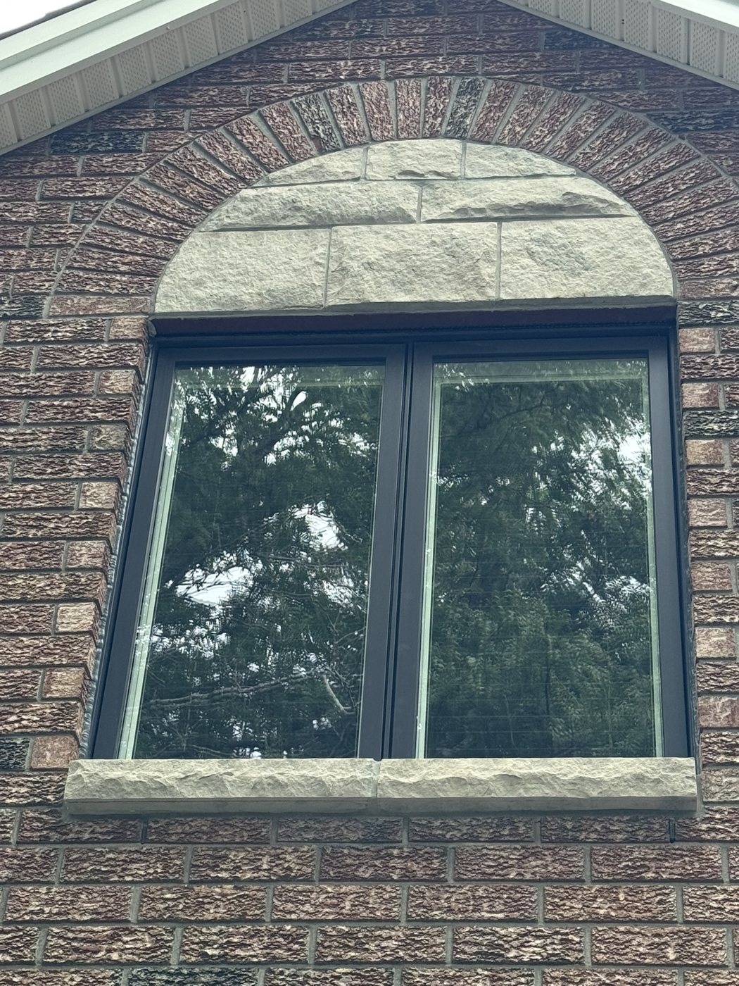 Natural stone window arch and sill, Ottawa
