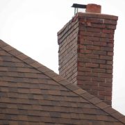 Chimney-with-no-chimney-cap-and-damaged-flues